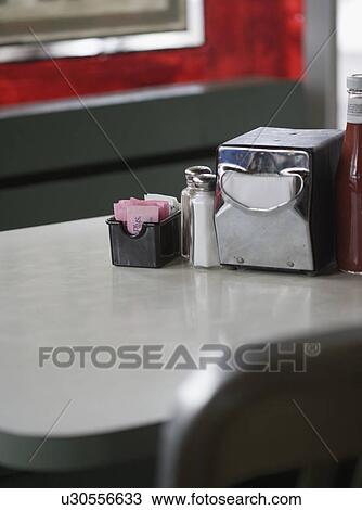 Still life of table in diner View Large Photo Image Stock Image - Still life of table in diner. Fotosearch