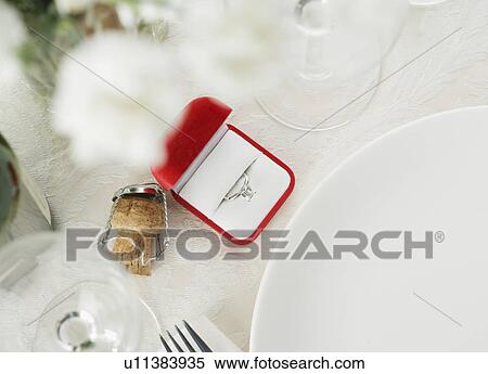 Still life of table setting and engagement ring View Large Photo Image Stock Photography - Still life of table setting and engagement ring. Fotosearch