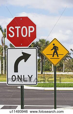 Street signs at intersection View Large Photo Image Stock Photograph - Street signs at intersection. Fotosearch