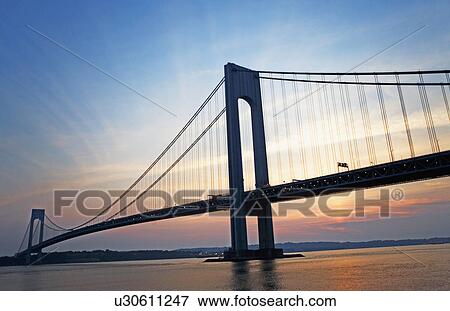 Sunrise at Verrazano bridge, New York, United States View Large Photo Image Stock Photo - Sunrise at Verrazano bridge, New York, United States. Fotosearch