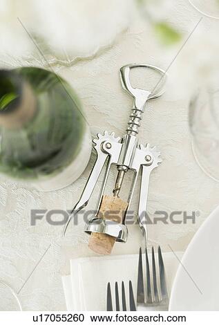 Table setting with wine and corkscrew View Large Photo Image Stock Image - Table setting with wine and corkscrew. Fotosearch