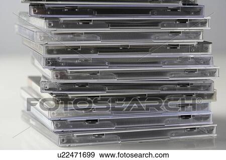 Tall stack of CDs View Large Photo Image Stock Photo - Tall stack of CDs. Fotosearch