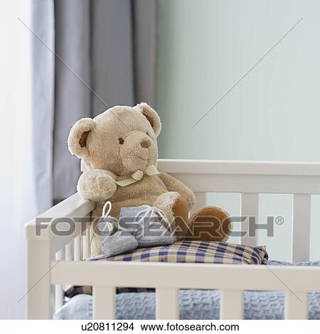 Teddy bear in crib View Large Photo Image Picture - Teddy bear in crib. Fotosearch
