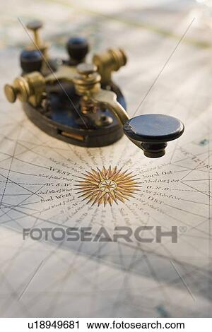 Telegraph key on antique map View Large Photo Image Stock Image - Telegraph key on antique map. Fotosearch