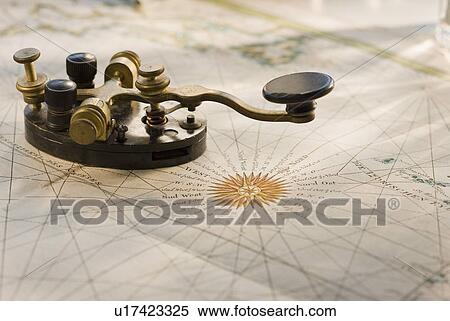 Telegraph key on antique map View Large Photo Image Stock Photography - Telegraph key on antique map. Fotosearch