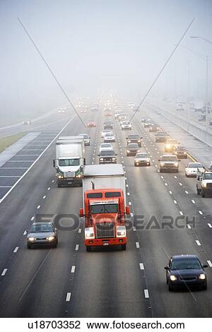 Stock Image - Traffic on large highway. Fotosearch