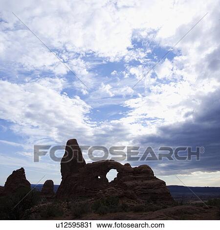 Stock Image - Turret Arch Arches National Park Moab Utah USA. Fotosearch