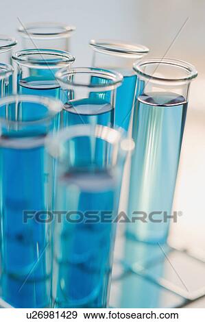 Vials of liquid in tray View Large Photo Image Stock Photo - Vials of liquid in tray. Fotosearch