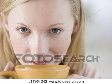 Woman drinking coffee View Large Photo Image Stock Image - Woman drinking coffee. Fotosearch