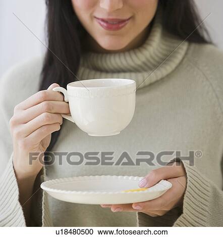 Woman drinking coffee View Large Photo Image Stock Image - Woman drinking coffee. Fotosearch