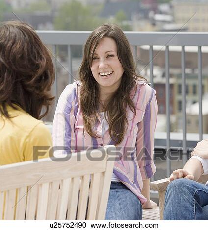 Woman laughing at party View Large Photo Image Stock Image - Woman laughing at party. Fotosearch