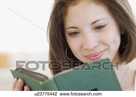 Woman reading book View Large Photo Image Stock Image - Woman reading book. Fotosearch
