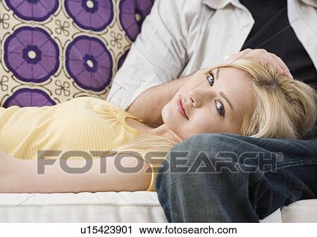 Woman resting head on boyfriend’s lap View Large Photo Image Stock Image - Woman resting head on boyfriend’s lap. Fotosearch
