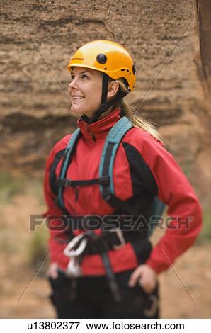 Woman wearing rappelling gear View Large Photo Image Stock Photo - Woman wearing rappelling gear. Fotosearch