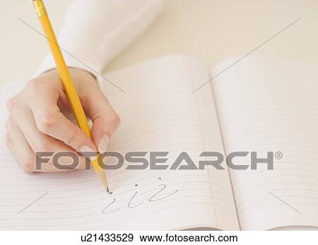 Woman writing question marks in notebook View Large Photo Image Stock Photo - Woman writing question marks in notebook. Fotosearch
