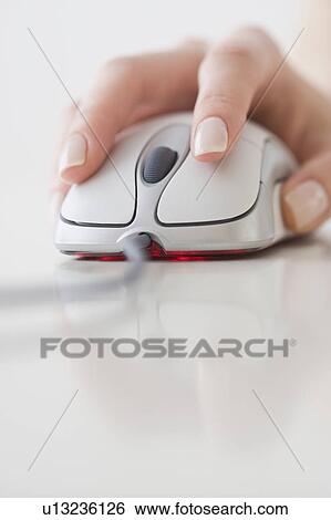 Woman’s hand on computer mouse View Large Photo Image Stock Photograph - Woman’s hand on computer mouse. Fotosearch