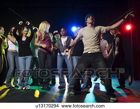 Young people at dance club View Large Photo Image Picture - Young people at dance club. Fotosearch