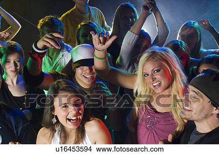 Picture - Young people at dance club. Fotosearch