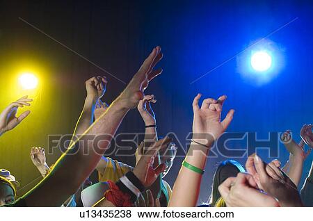 Stock Photo - Young people at dance club. Fotosearch