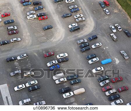Stock Photograph - Aerial view of cars in parking lot. Fotosearch