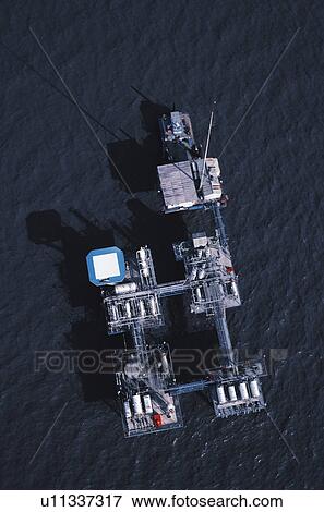 Stock Photo - Aerial view of oil rig platform in the Gulf of Mexico. Fotosearch