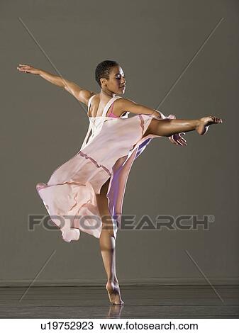 African female ballet dancer dancing View Large Photo Image Stock Image - African female ballet dancer dancing. Fotosearch