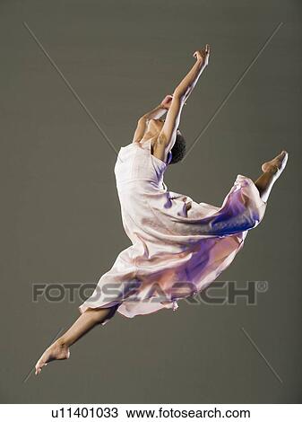 African female ballet dancer jumping View Large Photo Image Stock Image - African female ballet dancer jumping. Fotosearch
