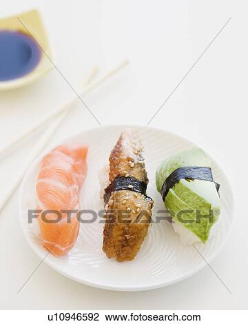 Assortment of sushi on plate View Large Photo Image Stock Image - Assortment of sushi on plate. Fotosearch