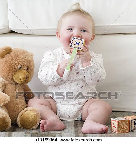 Baby playing with alphabet blocks View Large Photo Image Picture - Baby playing with alphabet blocks. Fotosearch