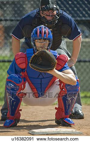 Baseball pitcher and umpire in ready position View Large Photo Image Stock Image - Baseball pitcher and umpire in ready position. Fotosearch