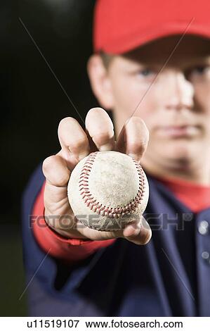 Baseball pitcher holding ball View Large Photo Image Stock Photo - Baseball pitcher holding ball. Fotosearch