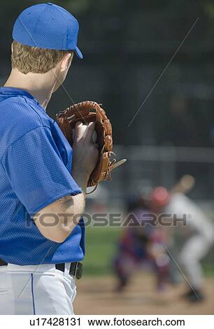 Baseball pitcher preparing to pitch ball View Large Photo Image Stock Image - Baseball pitcher preparing to pitch ball. Fotosearch