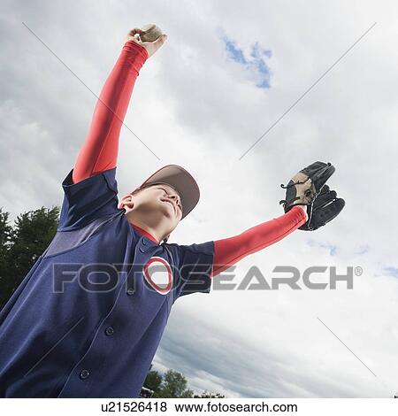 Baseball player celebrating with arms raised View Large Photo Image Stock Photo - Baseball player celebrating with arms raised. Fotosearch