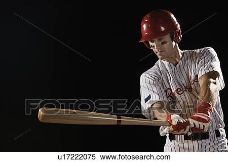 Baseball player swinging bat View Large Photo Image Stock Photography - Baseball player swinging bat. Fotosearch