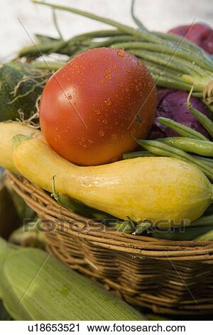 Stock Image - Basket of fresh vegetables. Fotosearch