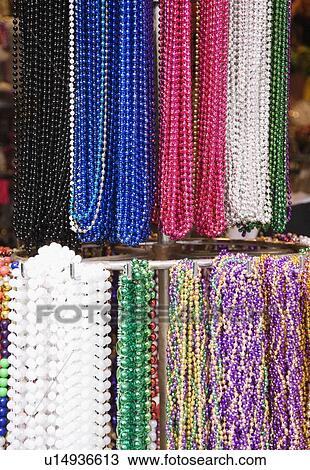 Bead necklaces hanging on rack, French Quarter, New Orleans, Louisiana, United States View Large Photo Image Stock Image - Bead necklaces hanging on rack, French Quarter, New Orleans, Louisiana, United States. Fotosearch