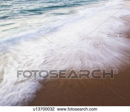 Blurred motion shot of ocean waves View Large Photo Image Stock Image - Blurred motion shot of ocean waves. Fotosearch