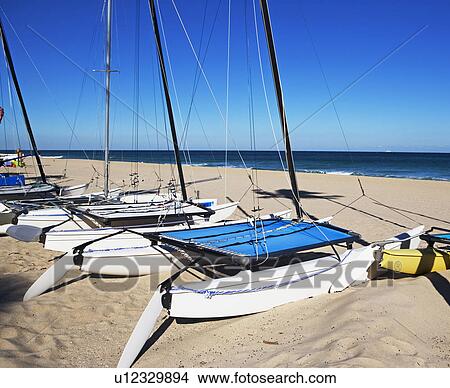 Picture - boats on a beach. Fotosearch