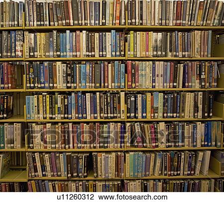 books on library shelves View Large Photo Image Stock Image - books on library shelves. Fotosearch