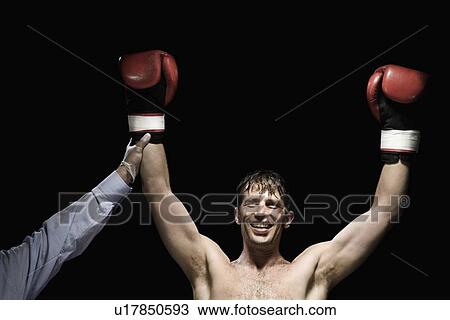 Boxer with arms raised View Large Photo Image Stock Image - Boxer with arms raised. Fotosearch