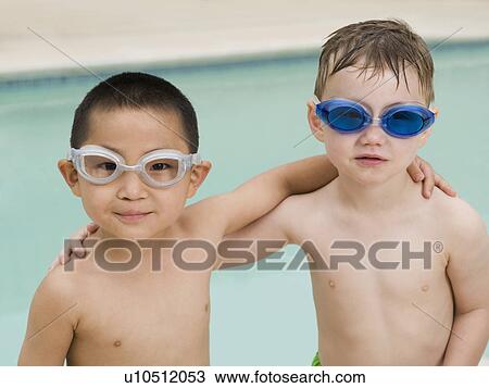 Boys in swim goggles posing View Large Photo Image Stock Image - Boys in swim goggles posing. Fotosearch