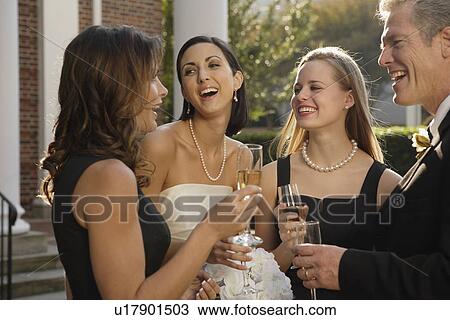 Bride drinking champagne with friends View Large Photo Image Stock Image - Bride drinking champagne with friends. Fotosearch