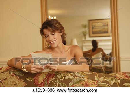 Stock Photograph - Bride reading letter. Fotosearch