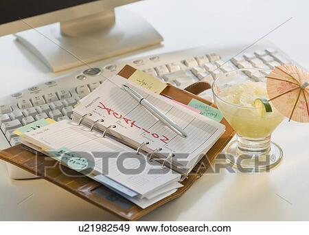 Stock Photo - Calendar marked with vacation dates. Fotosearch