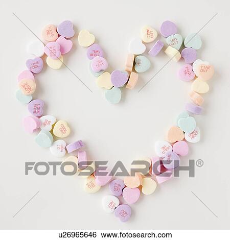 Candy hearts in shape of heart View Large Photo Image Stock Photograph - Candy hearts in shape of heart. Fotosearch