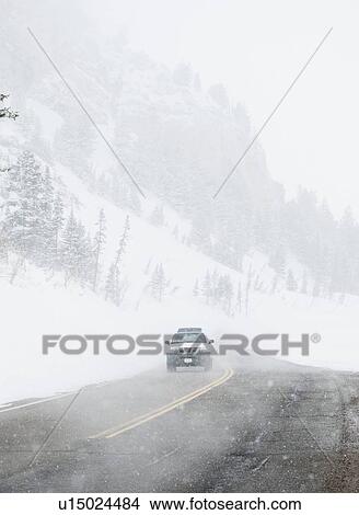 Car driving on snow road, Wasatch Mountains, Utah, United States View Large Photo Image Picture - Car driving on snow road, Wasatch Mountains, Utah, United States. Fotosearch
