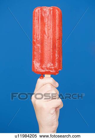 Child holding ice pop View Large Photo Image Stock Photography - Child holding ice pop. Fotosearch