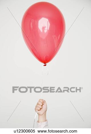 Child holding red balloon View Large Photo Image Stock Photography - Child holding red balloon. Fotosearch