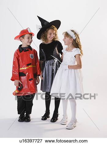 Children dressed in Halloween costumes View Large Photo Image Stock Photo - Children dressed in Halloween costumes. Fotosearch