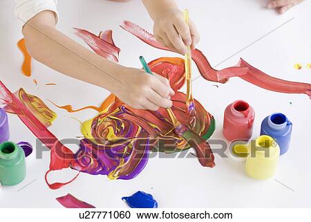 Children painting on table View Large Photo Image Stock Image - Children painting on table. Fotosearch
